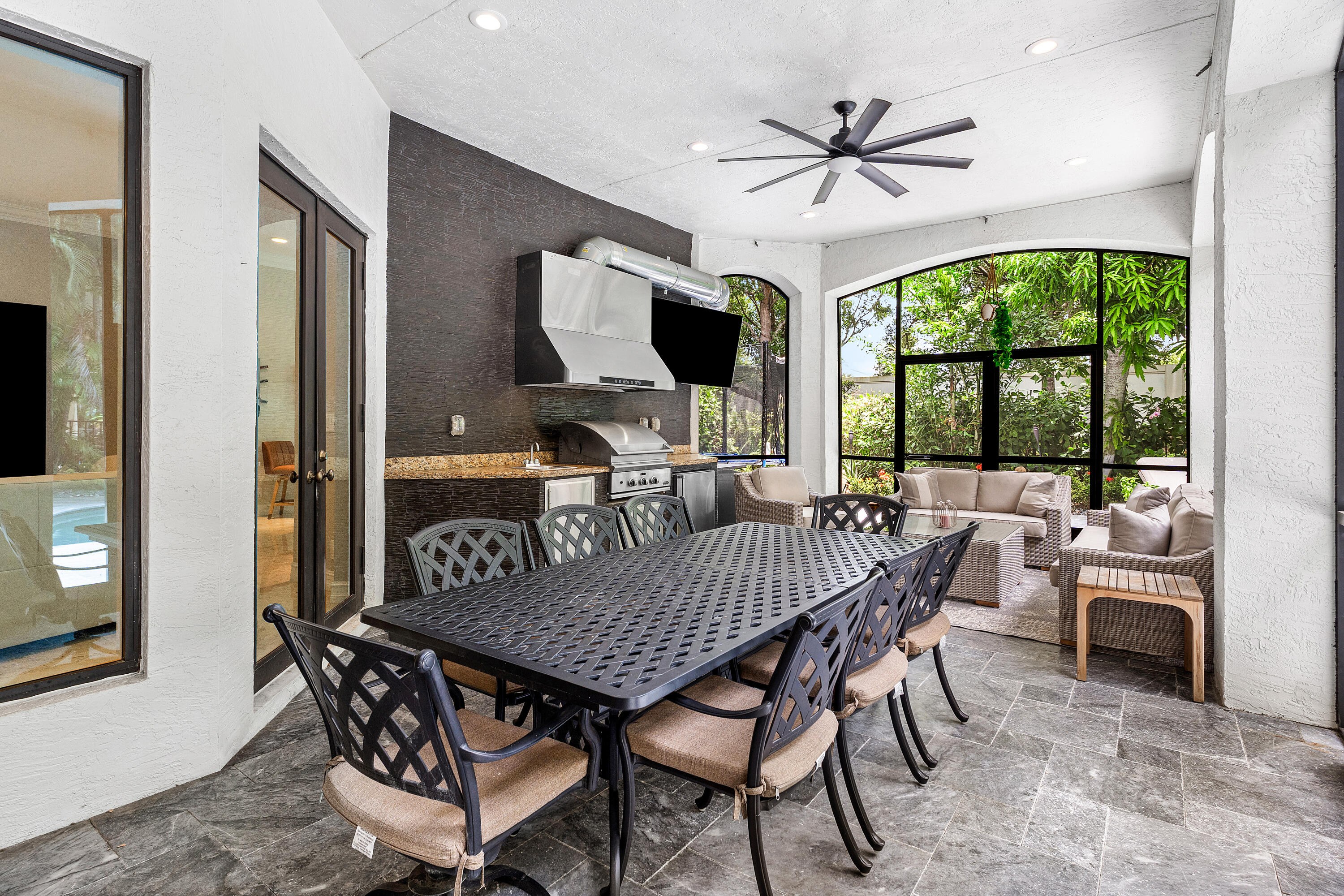 17657 Middlebrook Way Boca Raton, FL 33496 - Photo 53 of 98 a dining room with furniture a chandelier and wooden floor