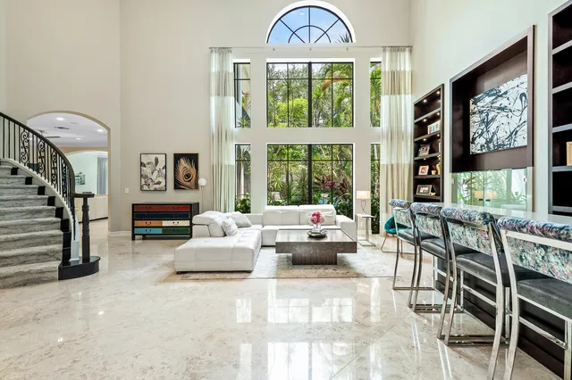 a kitchen with kitchen island granite countertop a sink and counter space