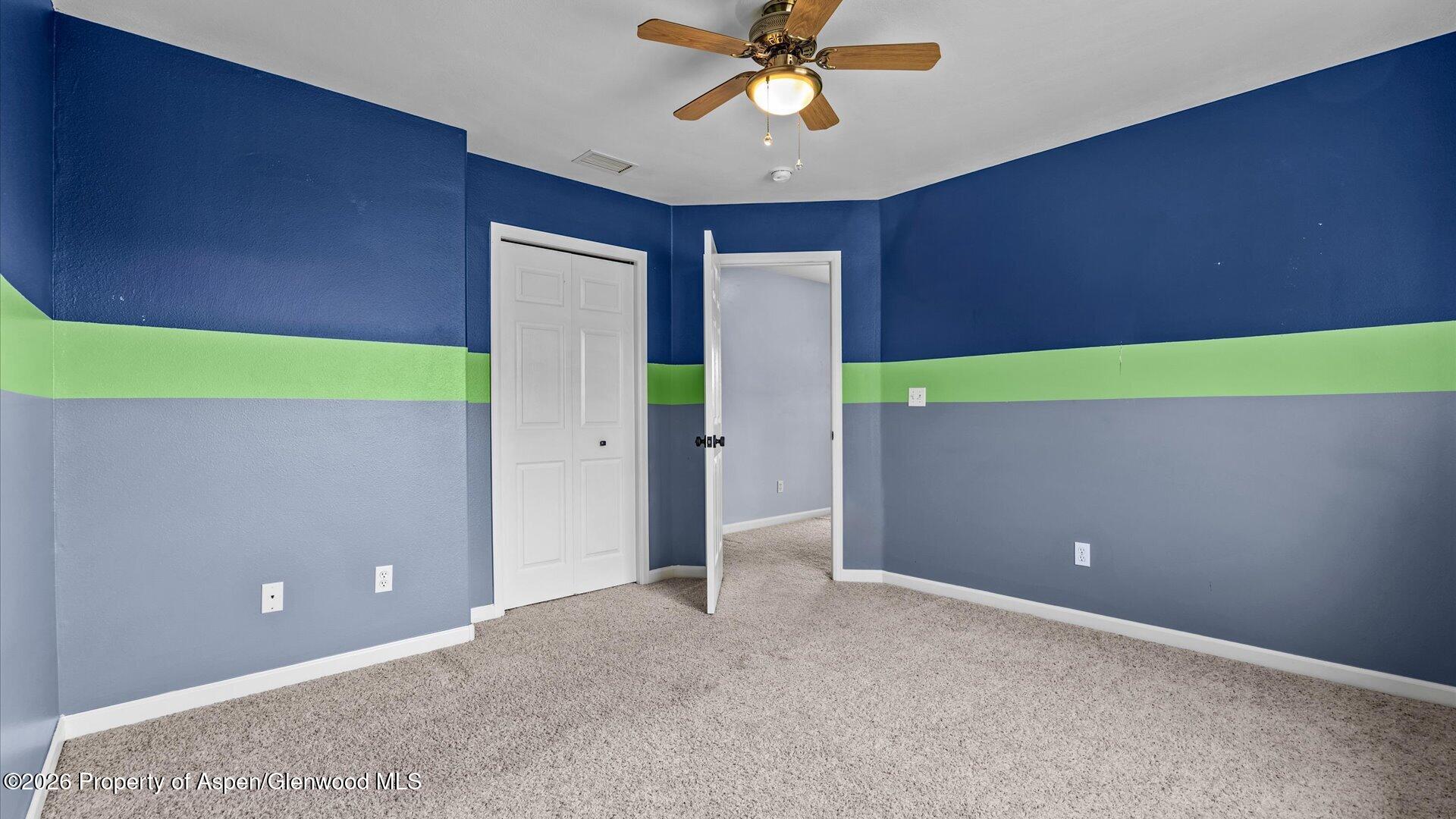 1459 Anvil View Avenue Rifle, CO 81650 - Photo 21 of 29 a view of room with window and ceiling fan