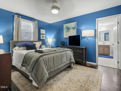 a view of hallway with wooden floor