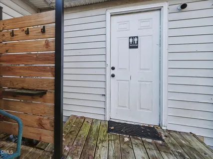 a bathroom with 2 sink and mirror