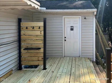 a view of a back yard of the house