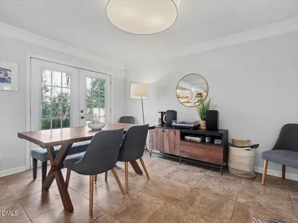 a view of a door and chair in a room