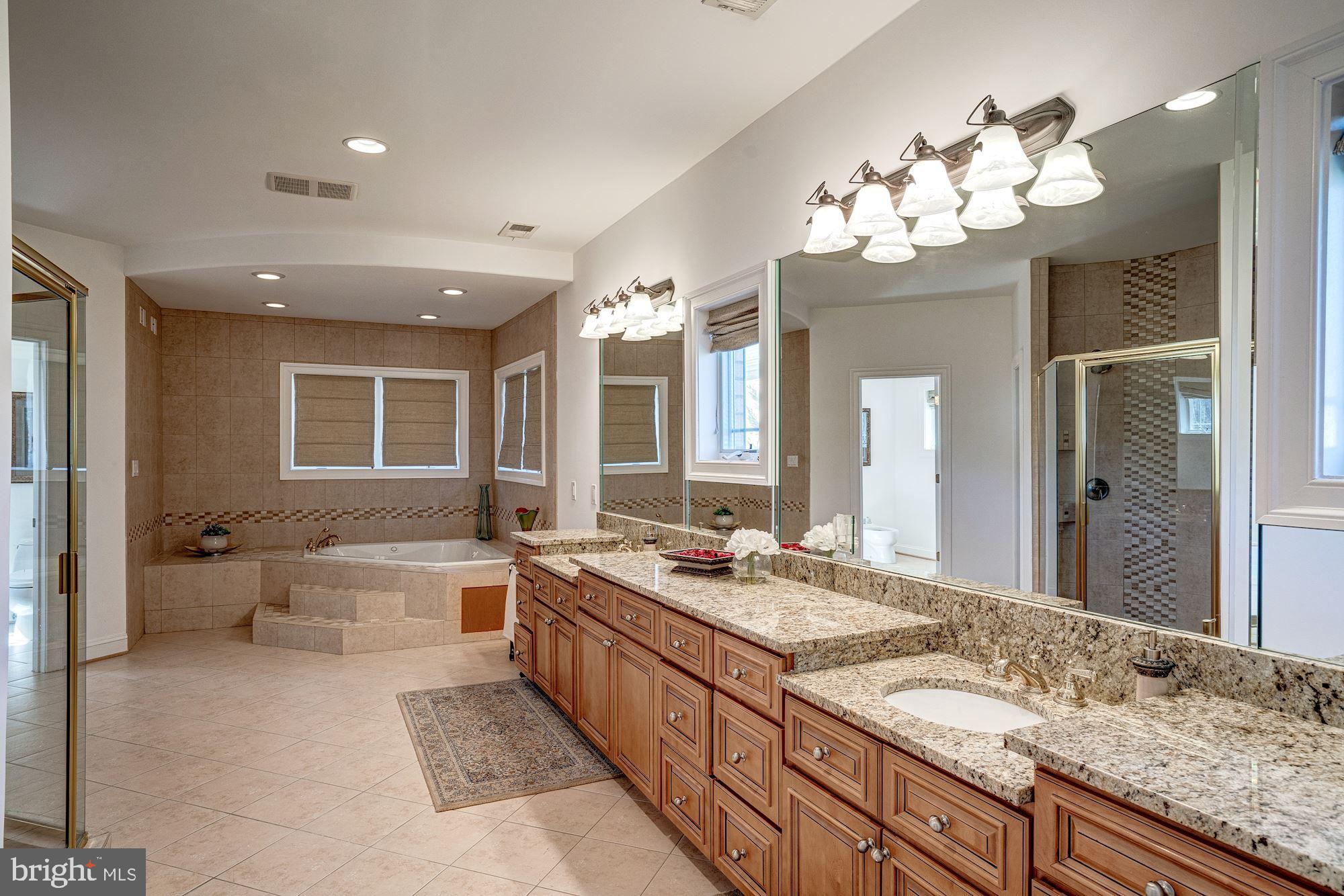 946 Seneca Road Great Falls, VA 22066 - Photo 51 of 106 Master bath w/ soaking tub & oversized shower