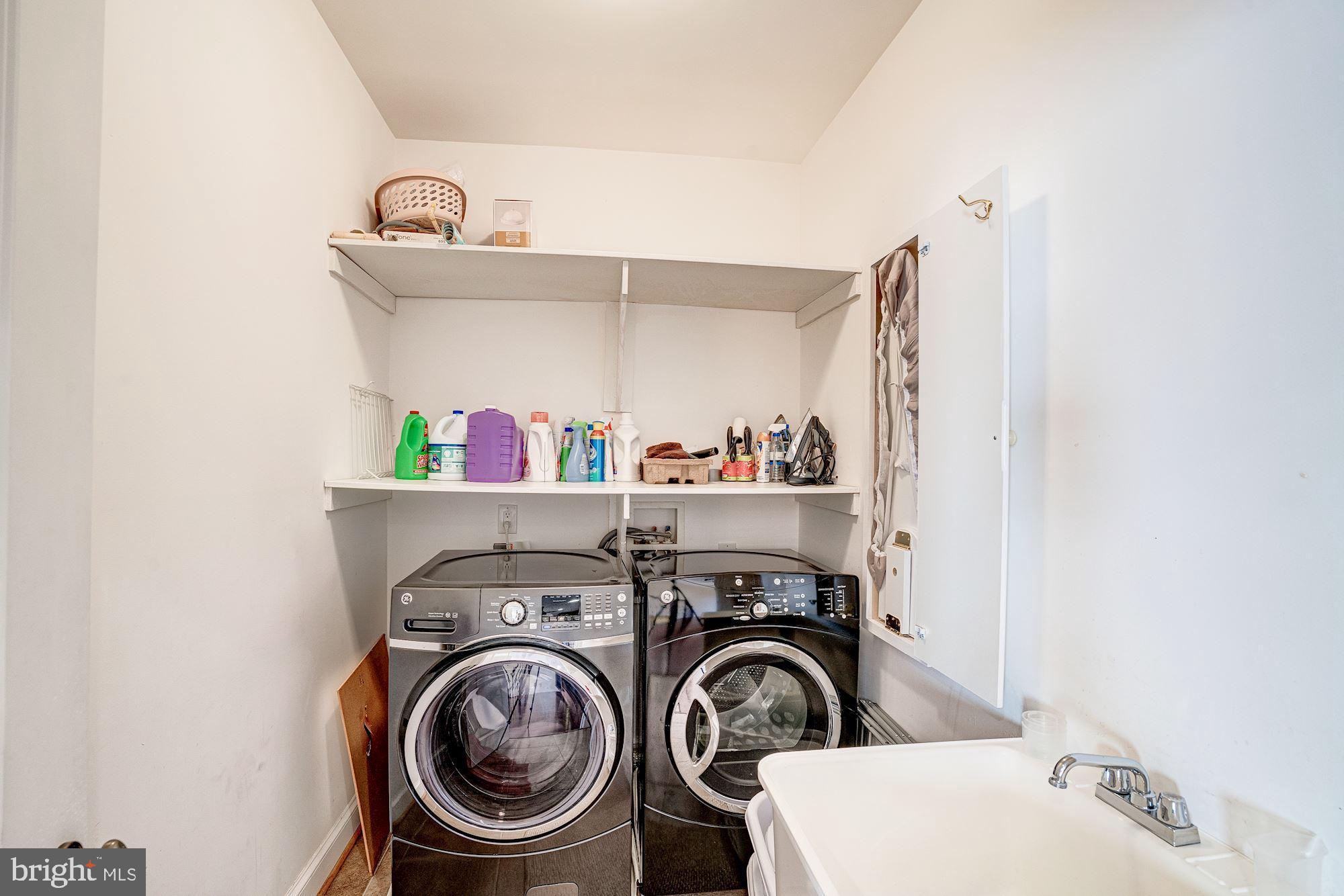 946 Seneca Road Great Falls, VA 22066 - Photo 69 of 106 Laundry room on the upper level near the bedrooms