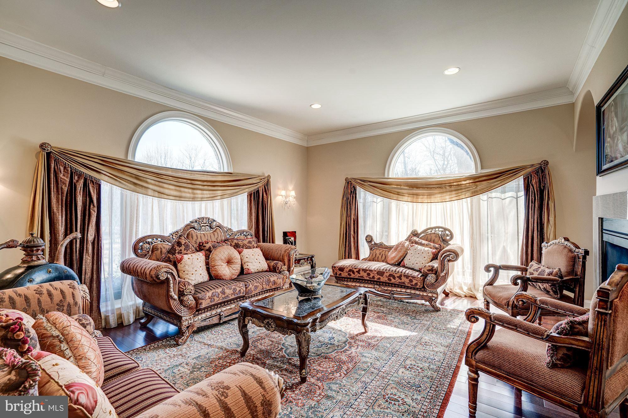 946 Seneca Road Great Falls, VA 22066 - Photo 10 of 106 Formal living room has a fireplace