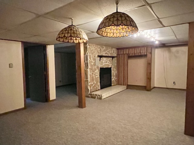 333 Fox Trot Dixon, IL 61021 - Photo 15 of 21 an empty room with a fireplace and chandelier