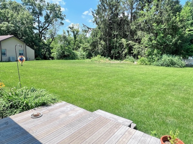 333 Fox Trot Dixon, IL 61021 - Photo 20 of 21 a wooden bench sitting in middle of the green field