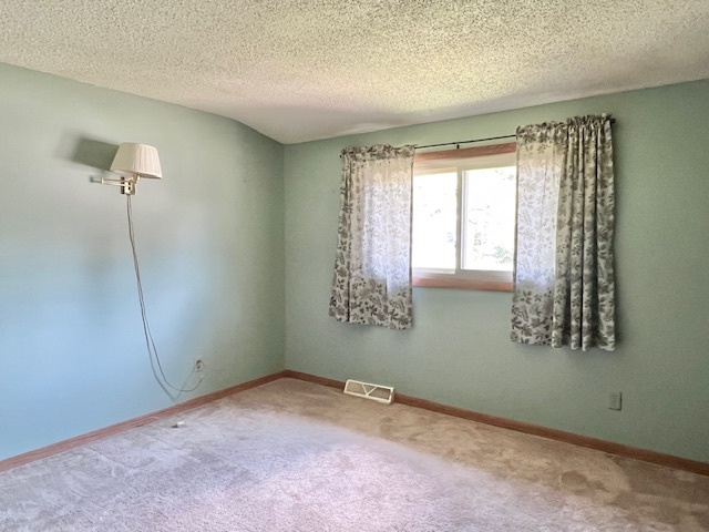 333 Fox Trot Dixon, IL 61021 - Photo 7 of 21 a view of an empty room and window