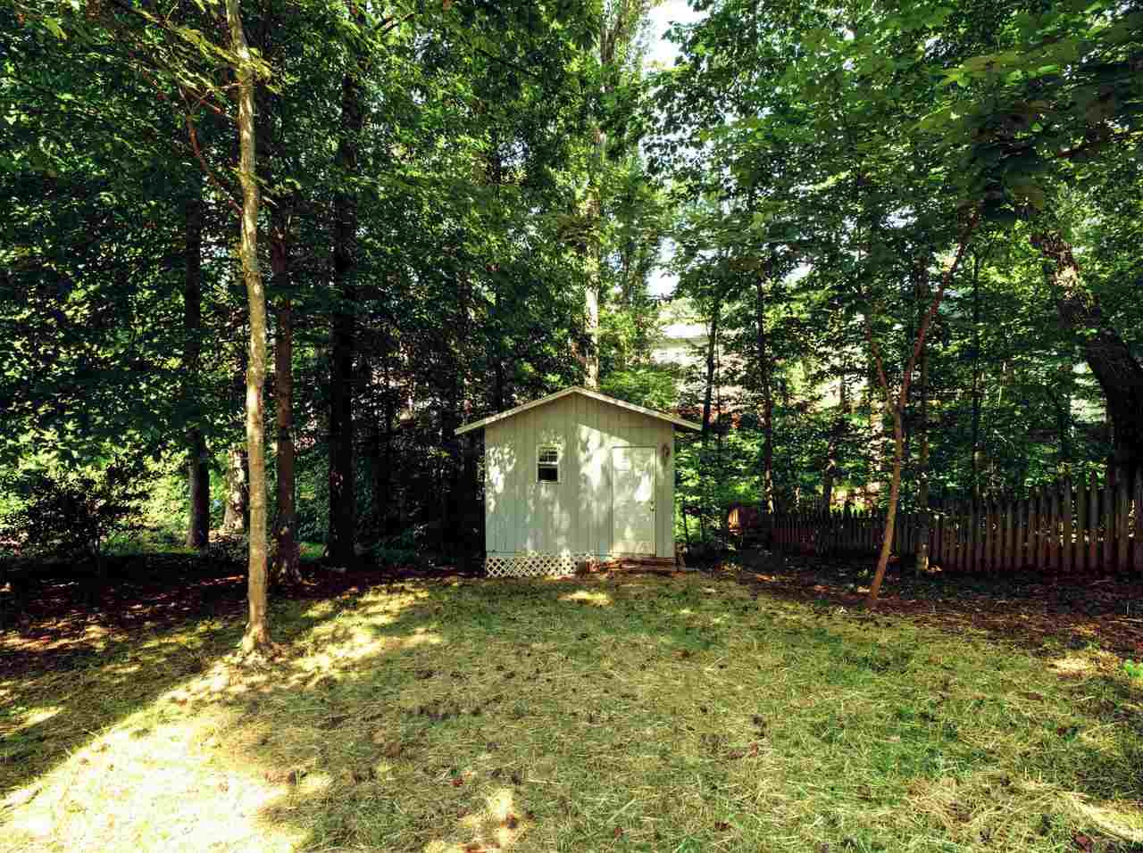 7901 Sandy Bottom Way Raleigh, NC 27613 - Photo 27 of 28 Enjoy the private back yard and additional storage afforded by the shed. Exterior Back