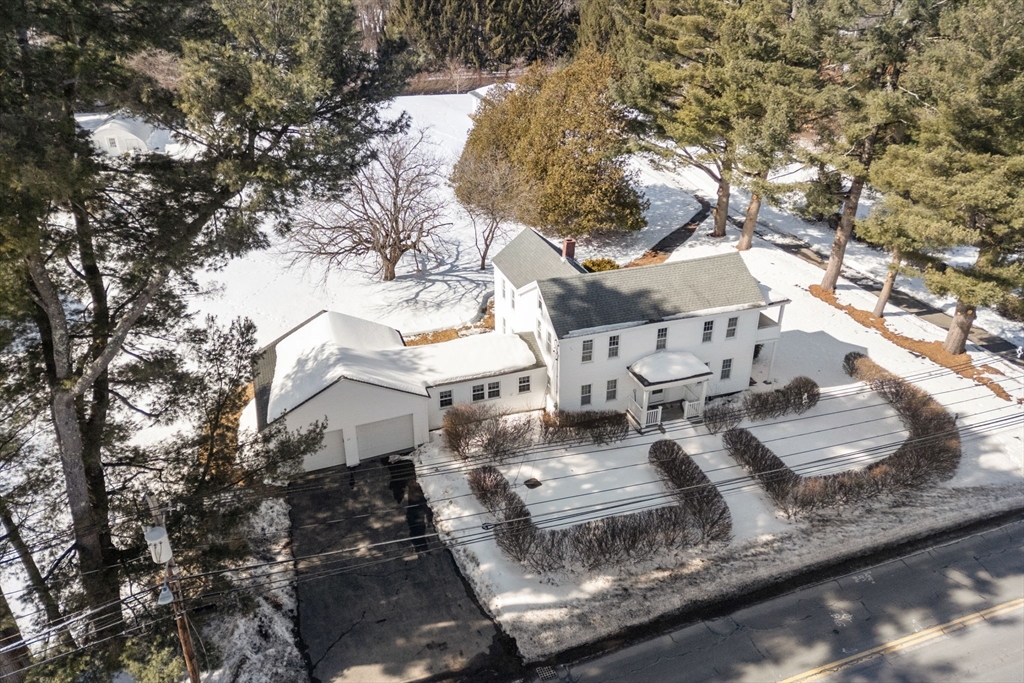 87 Landham Road Sudbury, MA 01776 - Photo 1 of 16 a view of a house with a yard