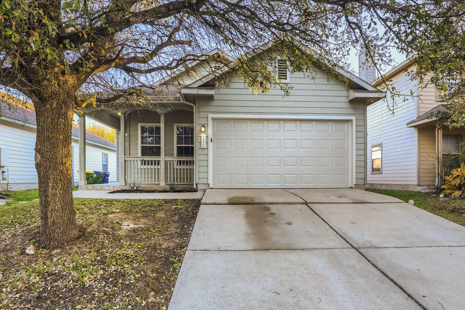 11502 Liberty Street Manor, TX 78653 - Photo 1 of 18 a front view of a house with a garage