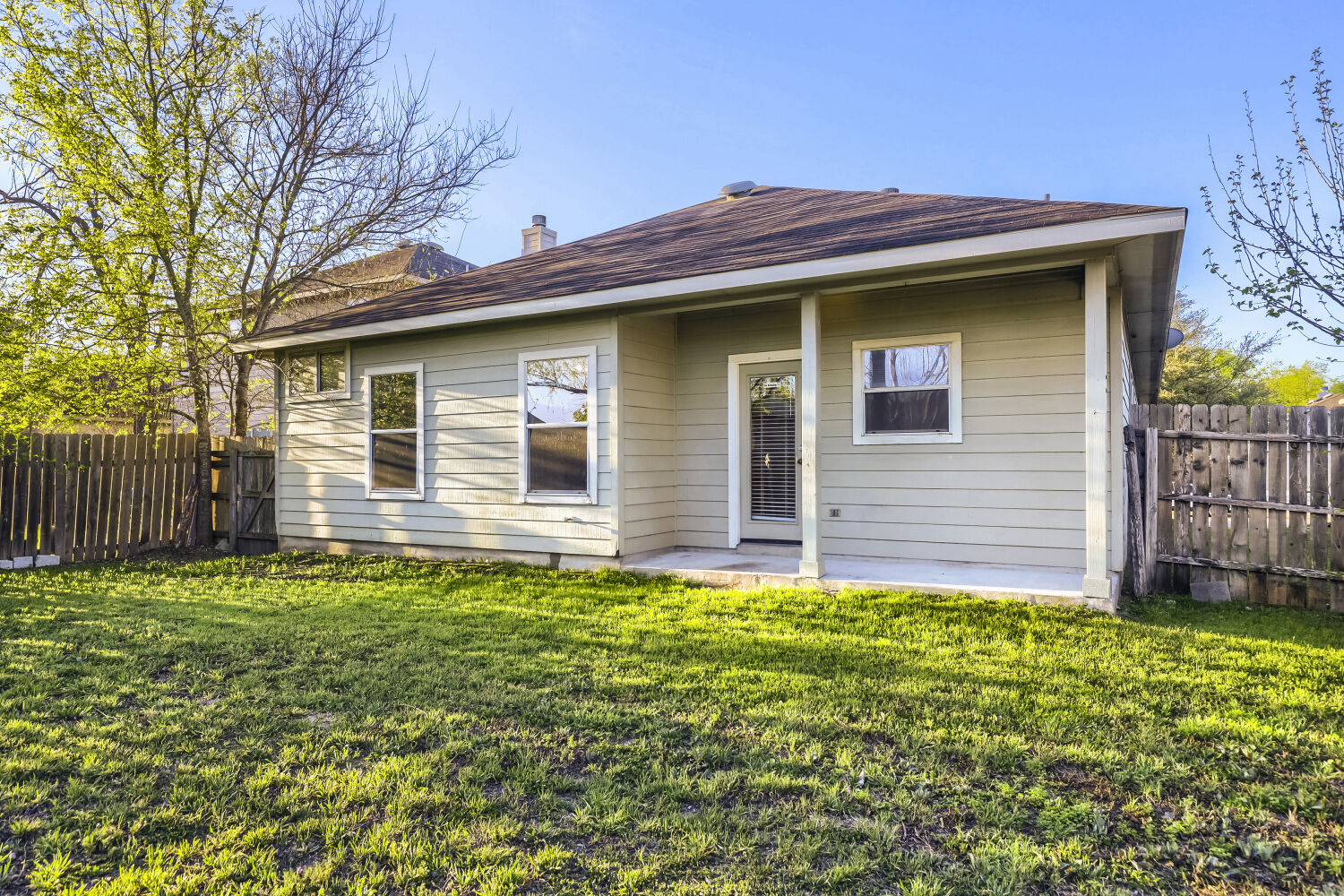 11502 Liberty Street Manor, TX 78653 - Photo 17 of 18 a front view of a house with garden