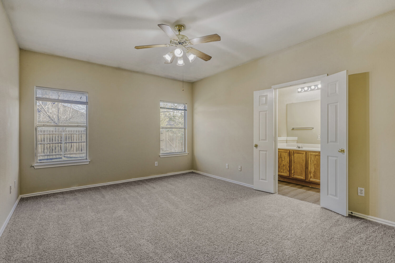 11502 Liberty Street Manor, TX 78653 - Photo 8 of 18 a view of an empty room with a window
