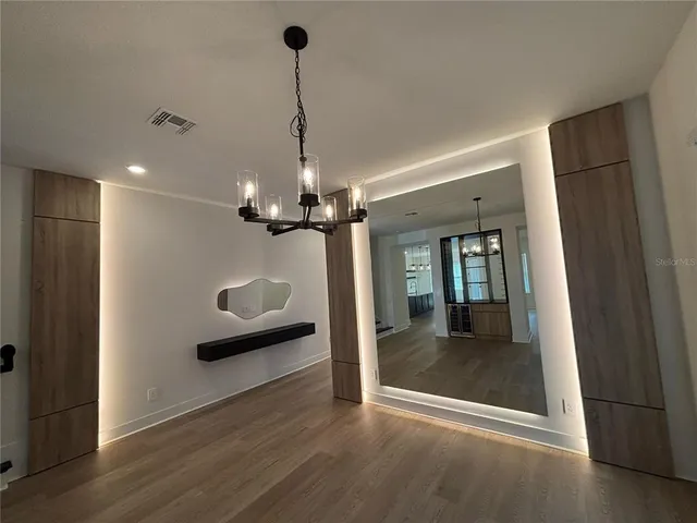 a view of livingroom with furniture and wooden floor