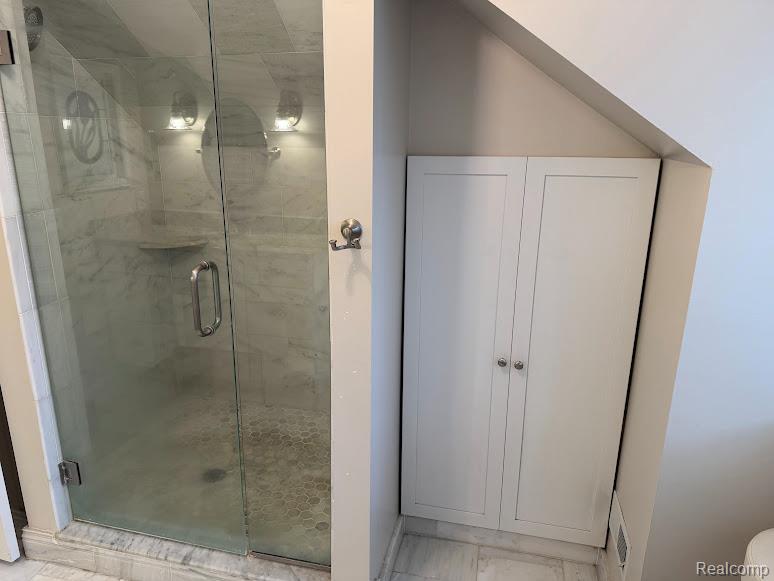 427 Wesley Street Rochester, MI 48307 - Photo 17 of 28 2nd Floor Master Bathroom #1 including Shower, sink, vanity & closet. Full bathroom with vanity, a shower stall, and light marble finish flooring