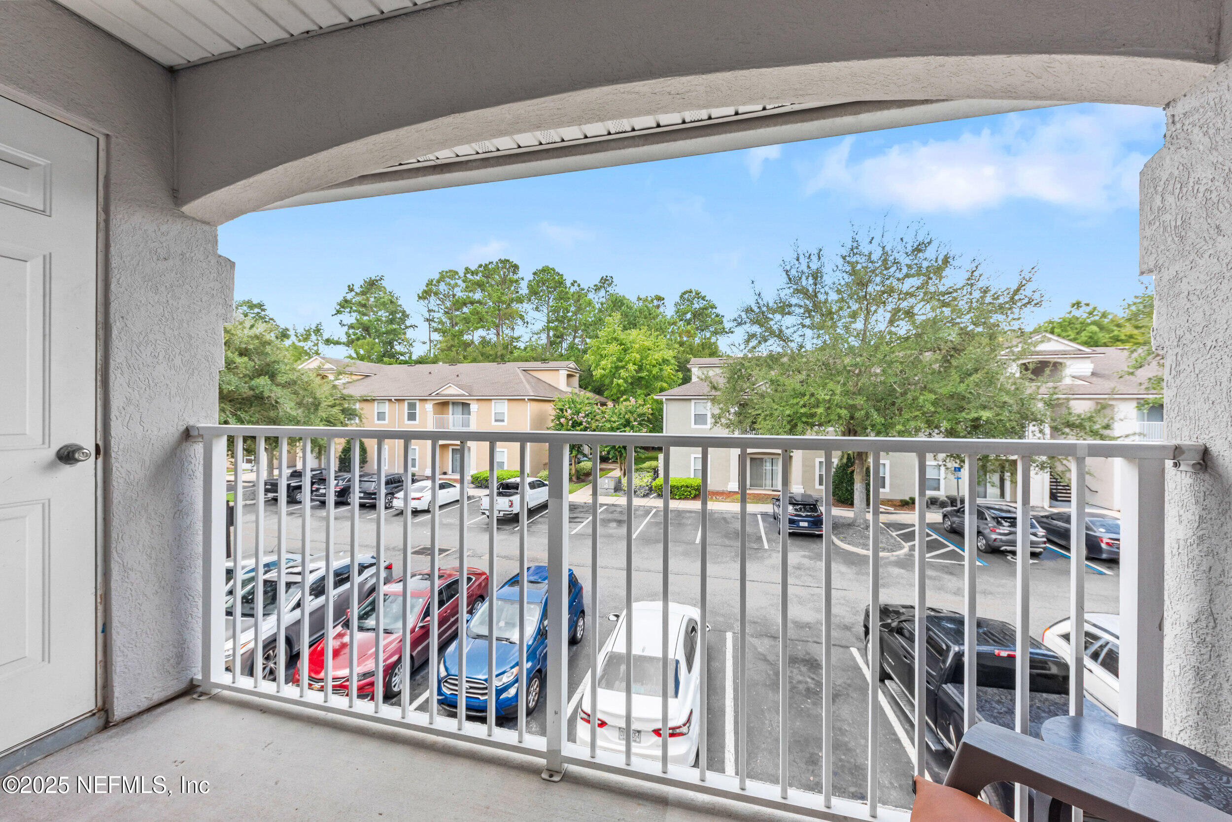 6094 Maggies Circle, Unit 109 Jacksonville, FL 32244 - Photo 22 of 30 a balcony with outdoor space
