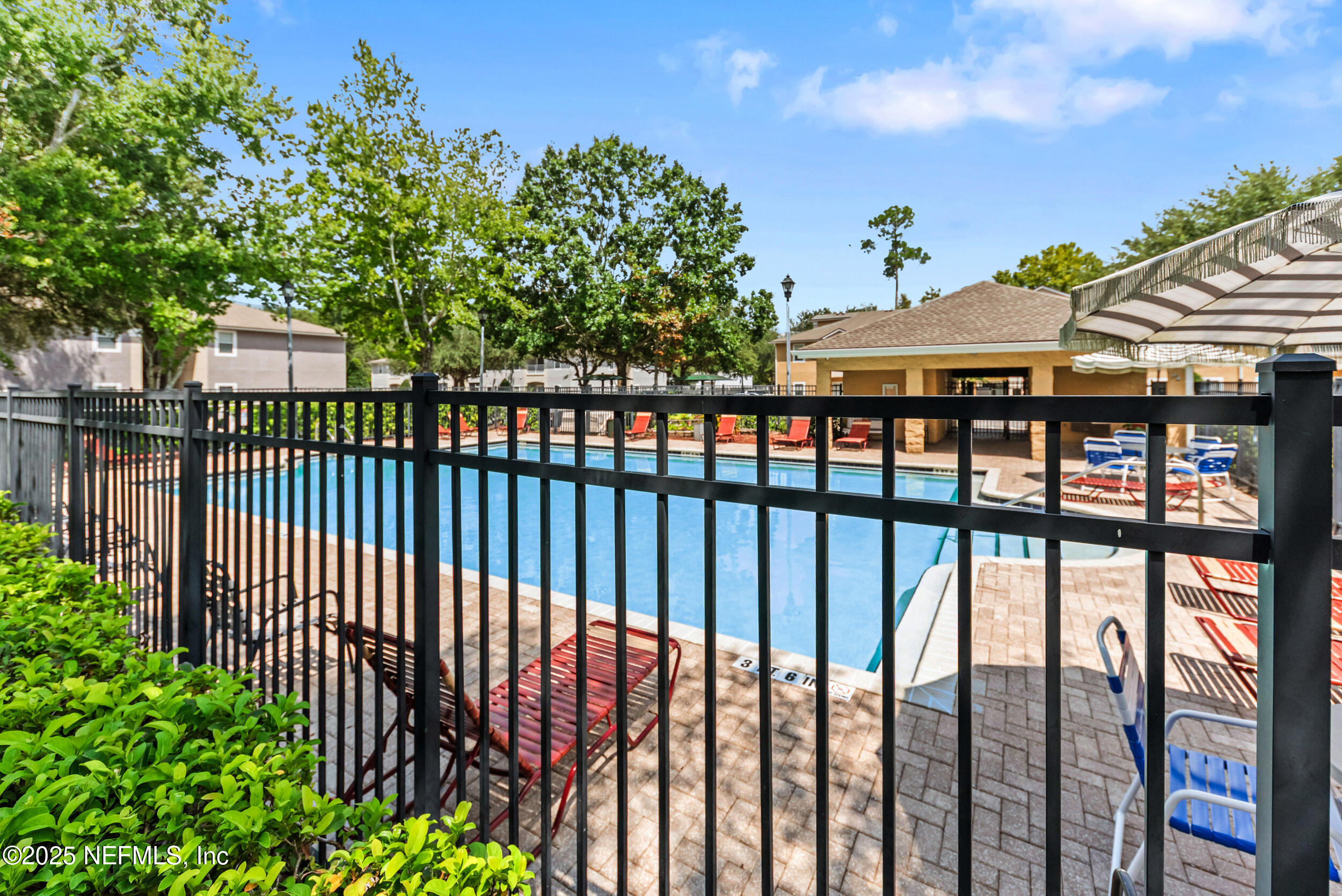 6094 Maggies Circle, Unit 109 Jacksonville, FL 32244 - Photo 28 of 30 a view of a porch and a garden