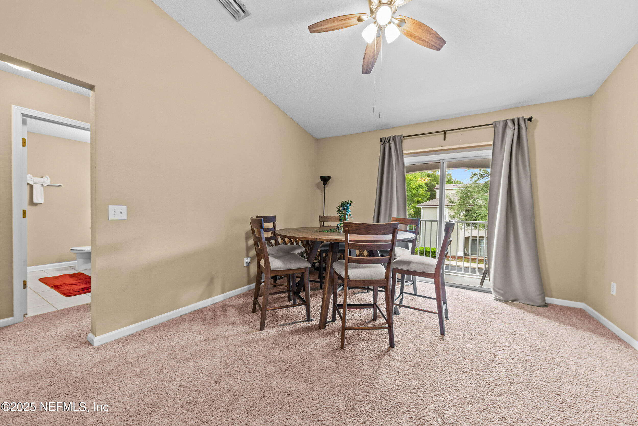 6094 Maggies Circle, Unit 109 Jacksonville, FL 32244 - Photo 8 of 30 a dining room with furniture and window