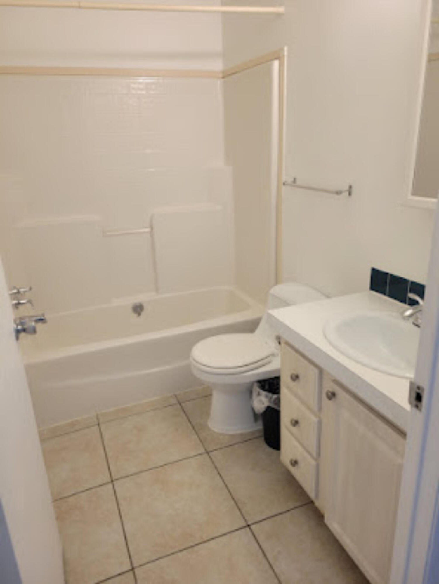31037 Ave D Big Pine Key, FL 33043 - Photo 11 of 20 a bathroom with a sink a toilet and shower