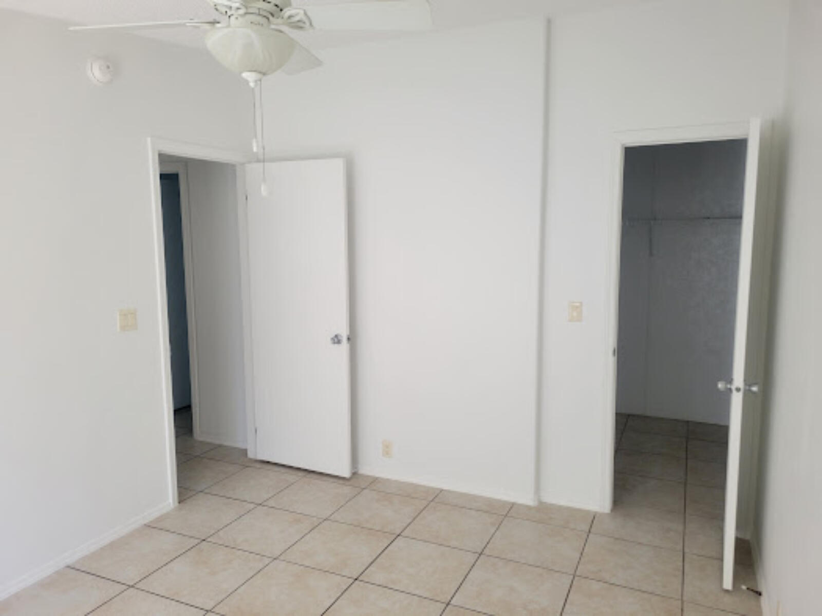 31037 Ave D Big Pine Key, FL 33043 - Photo 2 of 20 a view of an empty room with chandelier fan