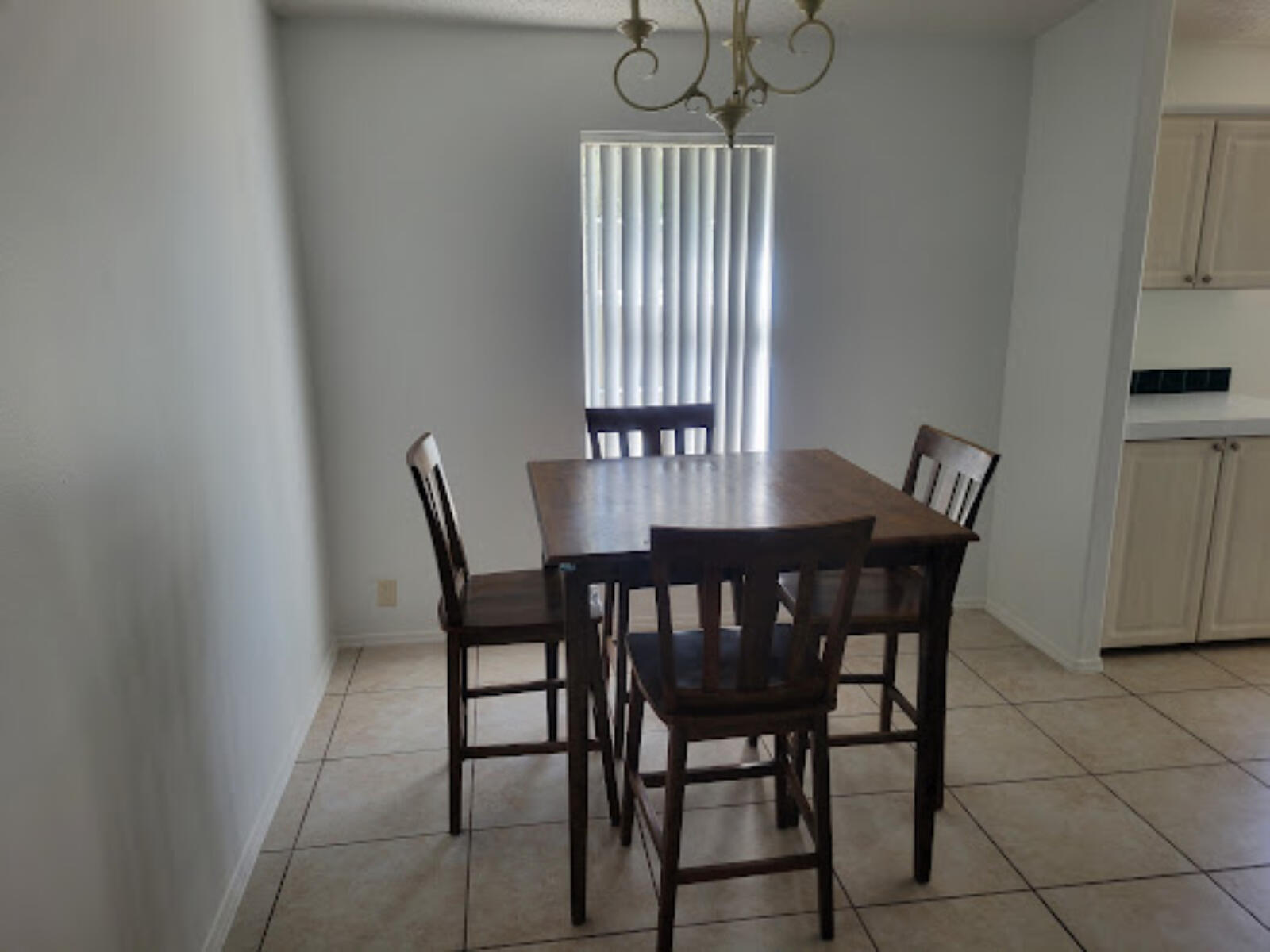 31037 Ave D Big Pine Key, FL 33043 - Photo 9 of 20 a view of a dining room with furniture and wooden floor