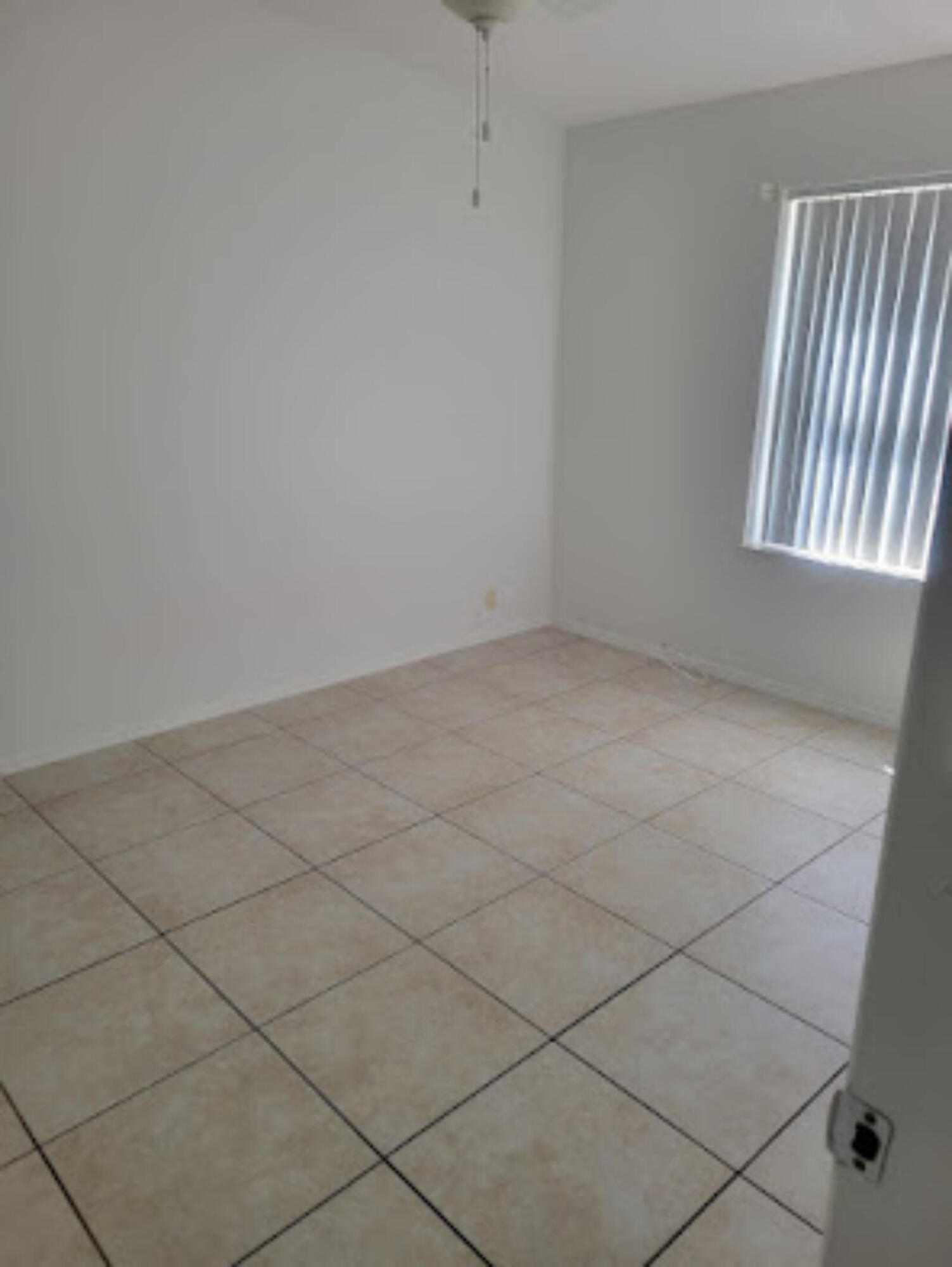 31037 Ave D Big Pine Key, FL 33043 - Photo 10 of 20 an empty room with windows