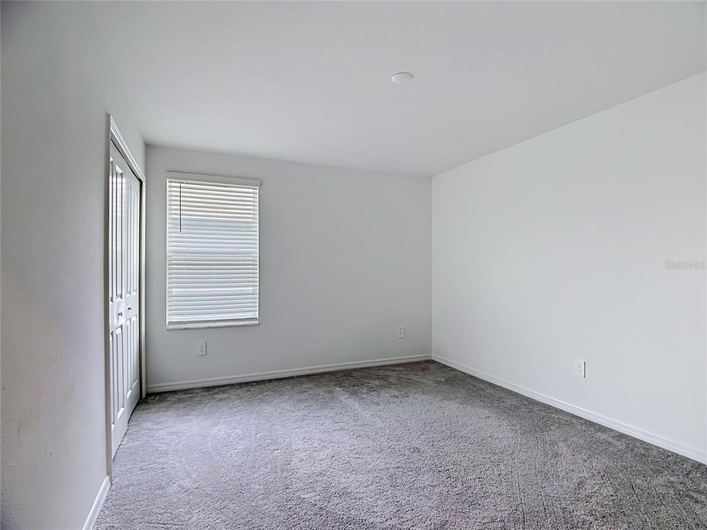 1633 Red Loop Lakeland, FL 33801 - Photo 30 of 60 an empty room with a window