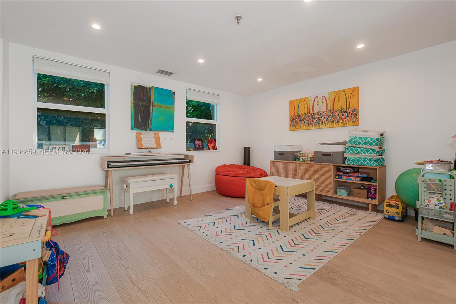 1005 8th Street, Unit 204 Miami Beach, FL 33139 - Photo 5 of 33 a living room with furniture and a table