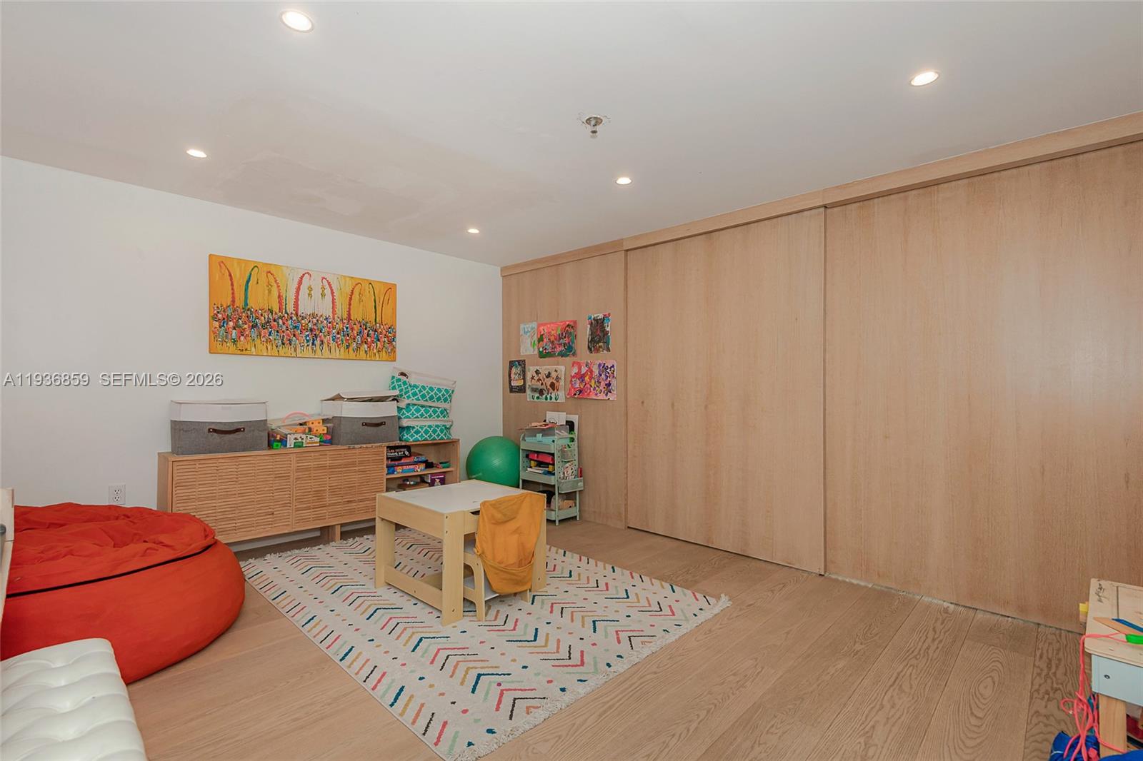 1005 8th Street, Unit 204 Miami Beach, FL 33139 - Photo 7 of 33 a living room with furniture and a rug