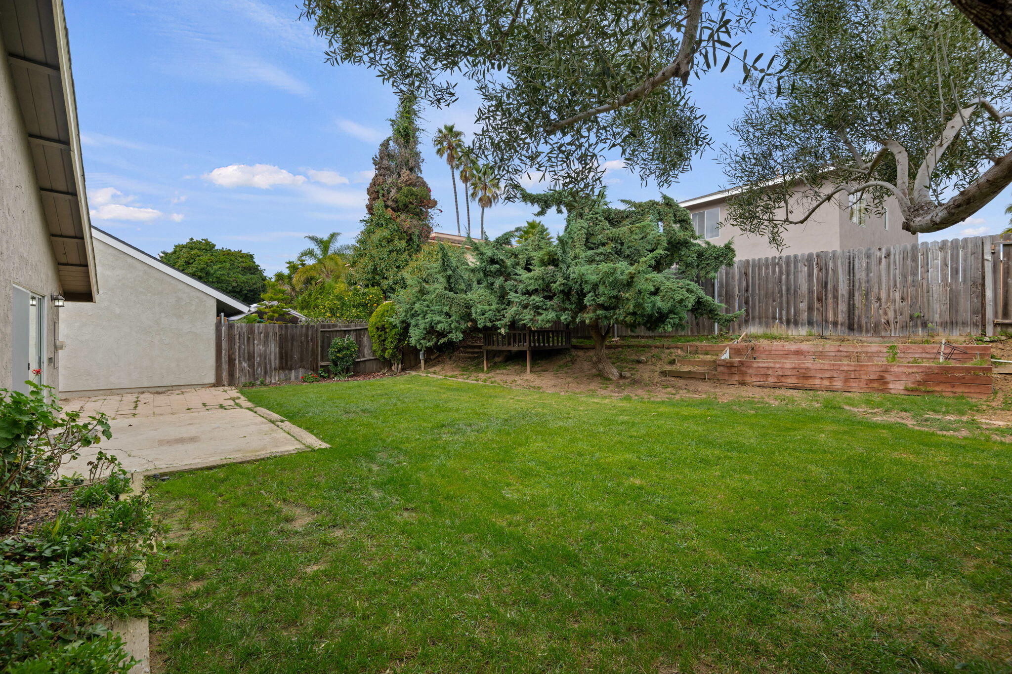 7344 Davenport Road Goleta, CA 93117 - Photo 18 of 21 a backyard of a house with lots of green space