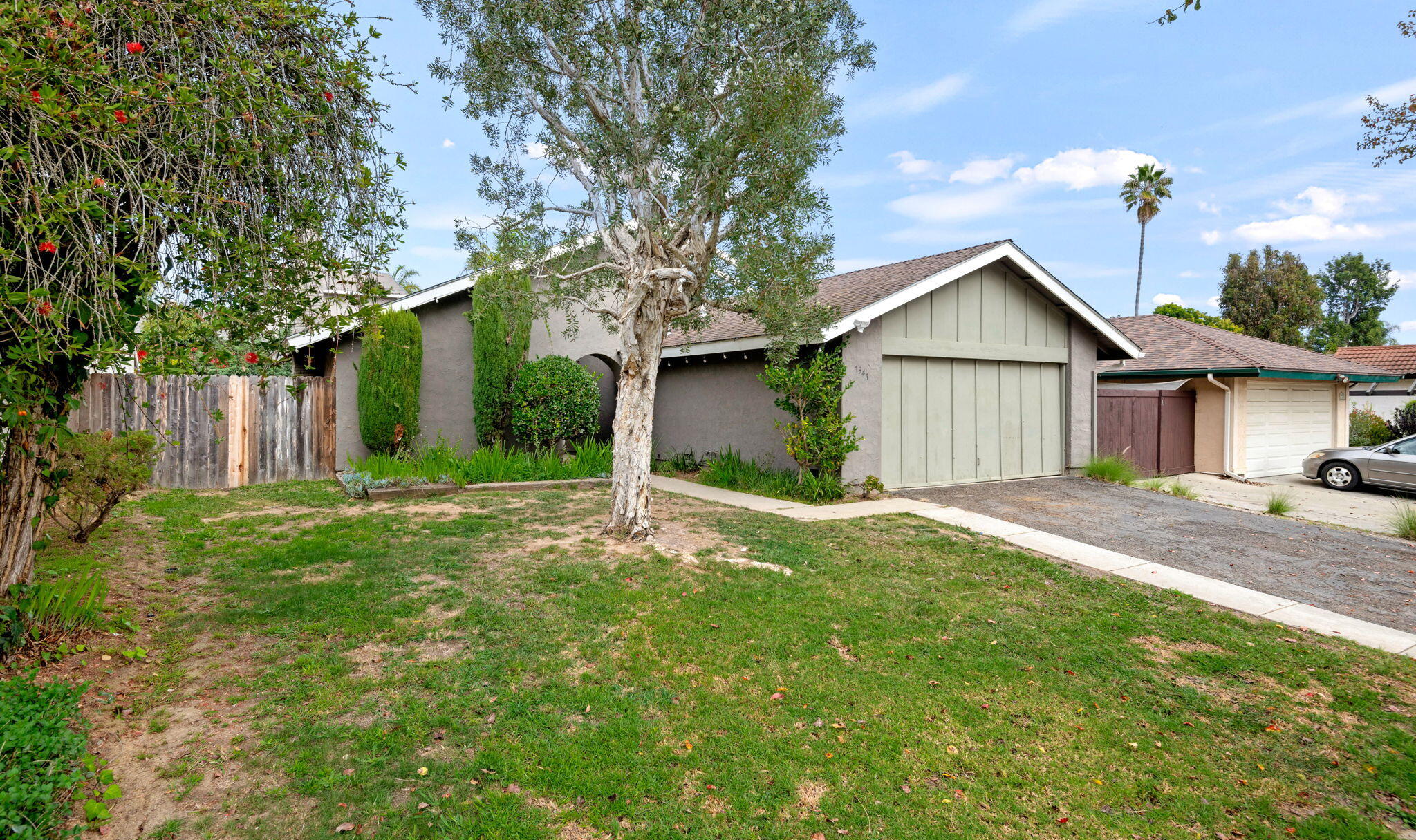 7344 Davenport Road Goleta, CA 93117 - Photo 2 of 21 a view of a house with a yard and large tree