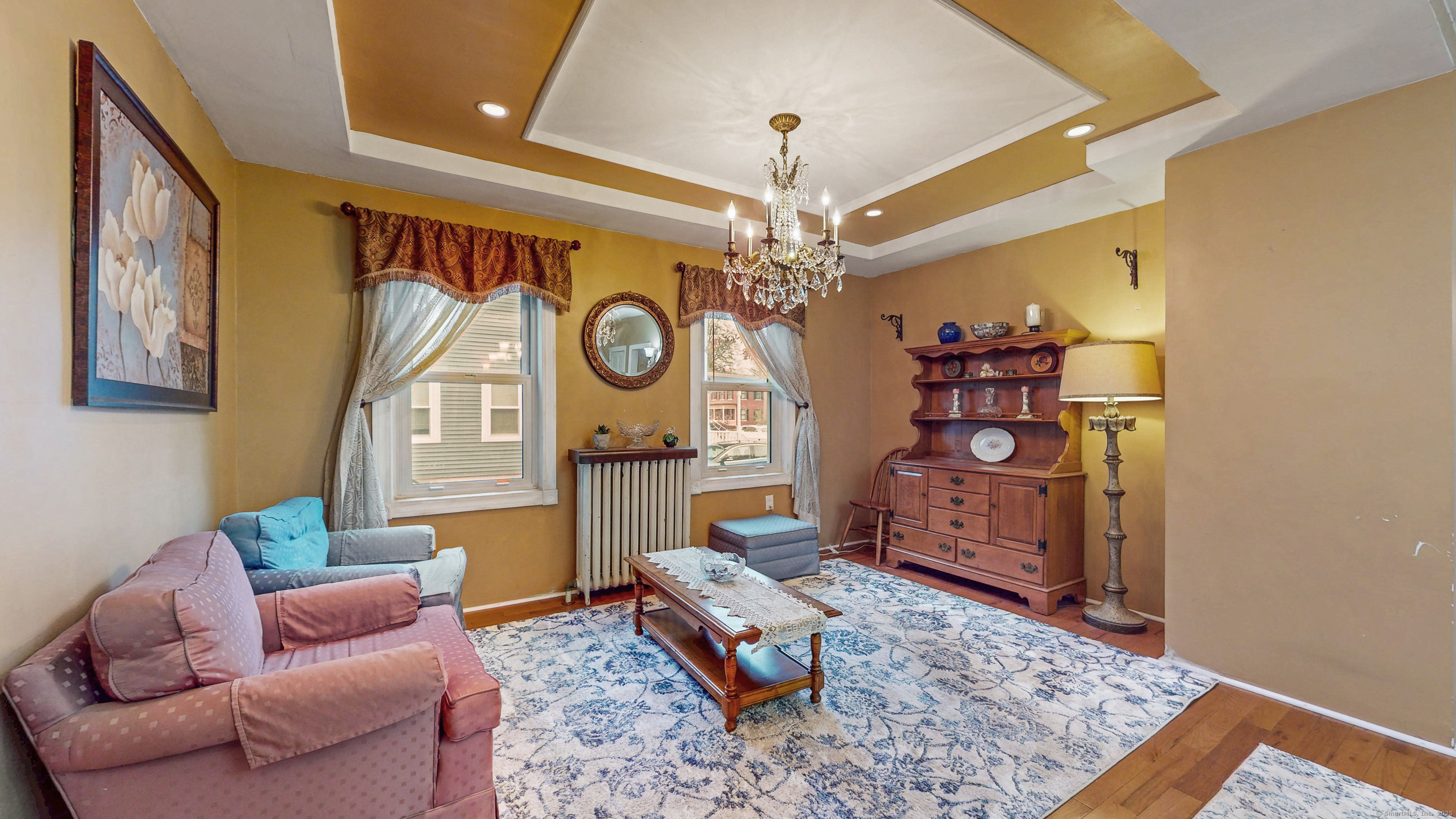 59 Elm Street Windsor Locks, CT 06096 - Photo 11 of 38 a living room with furniture and a table