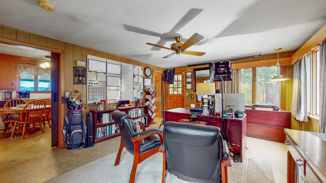 a very nice looking living room with furniture and a large window