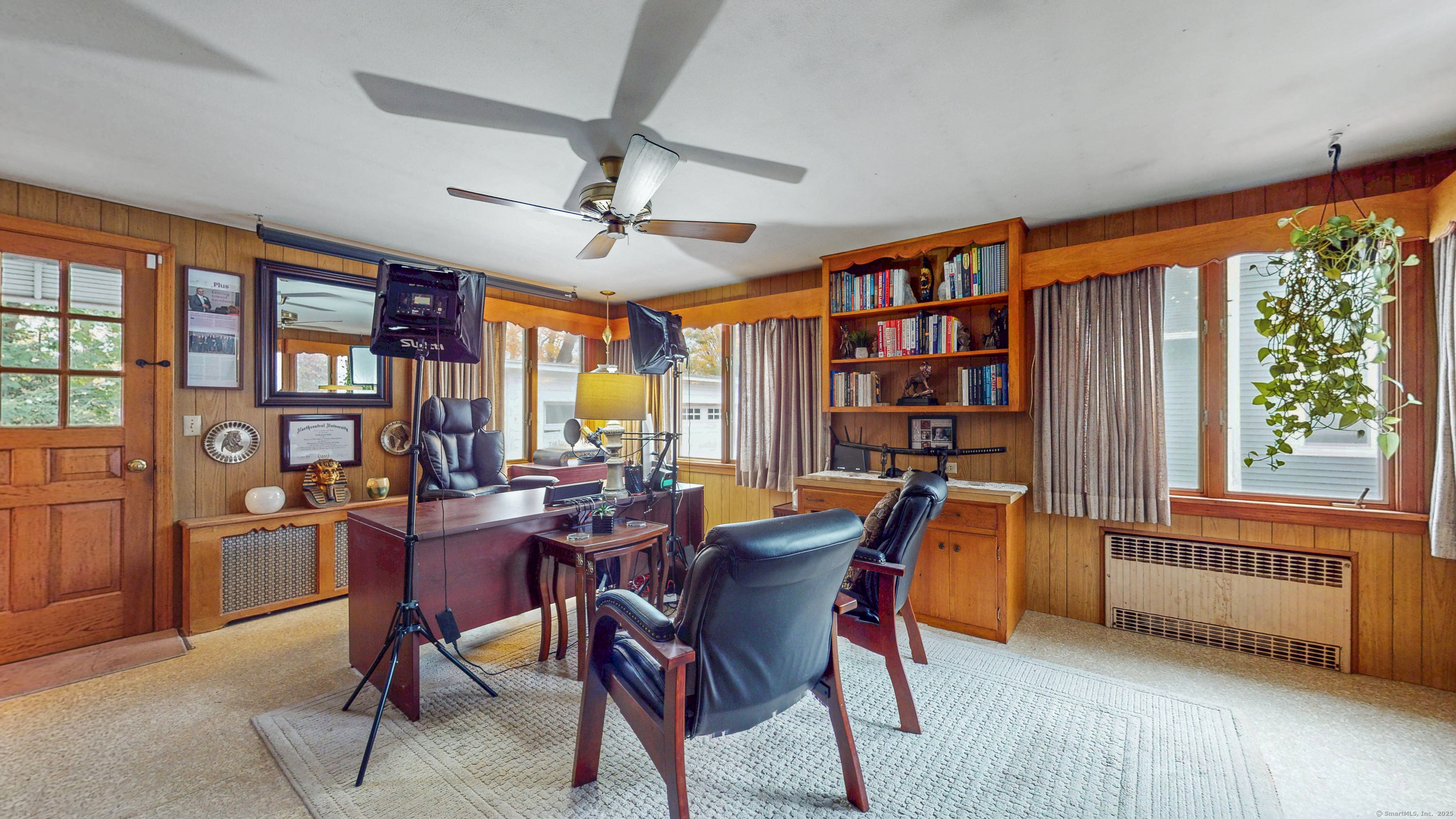 59 Elm Street Windsor Locks, CT 06096 - Photo 17 of 38 a view of a dining room with furniture window and wooden floor