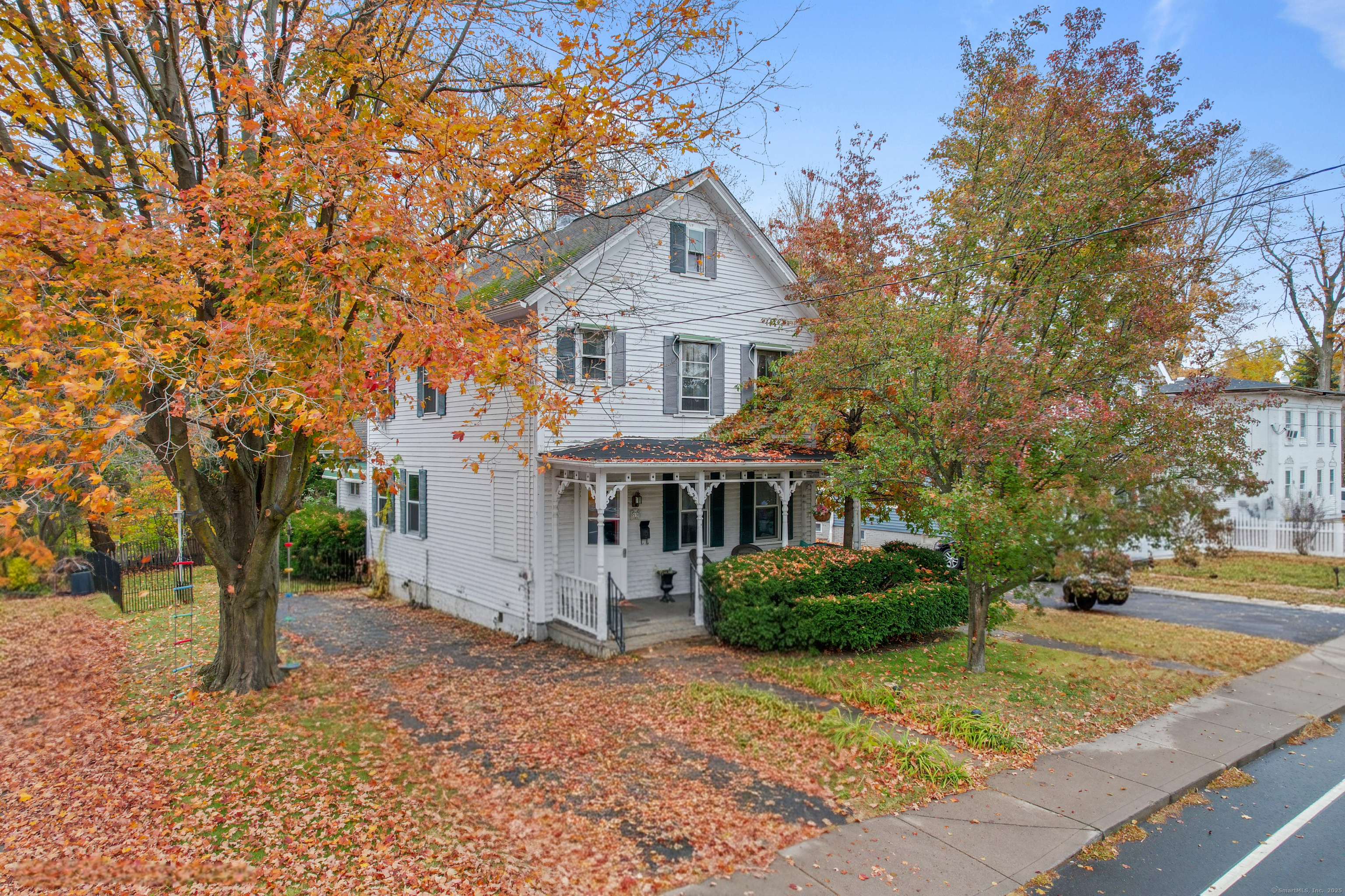59 Elm Street Windsor Locks, CT 06096 - Photo 30 of 38 a front view of a house with garden