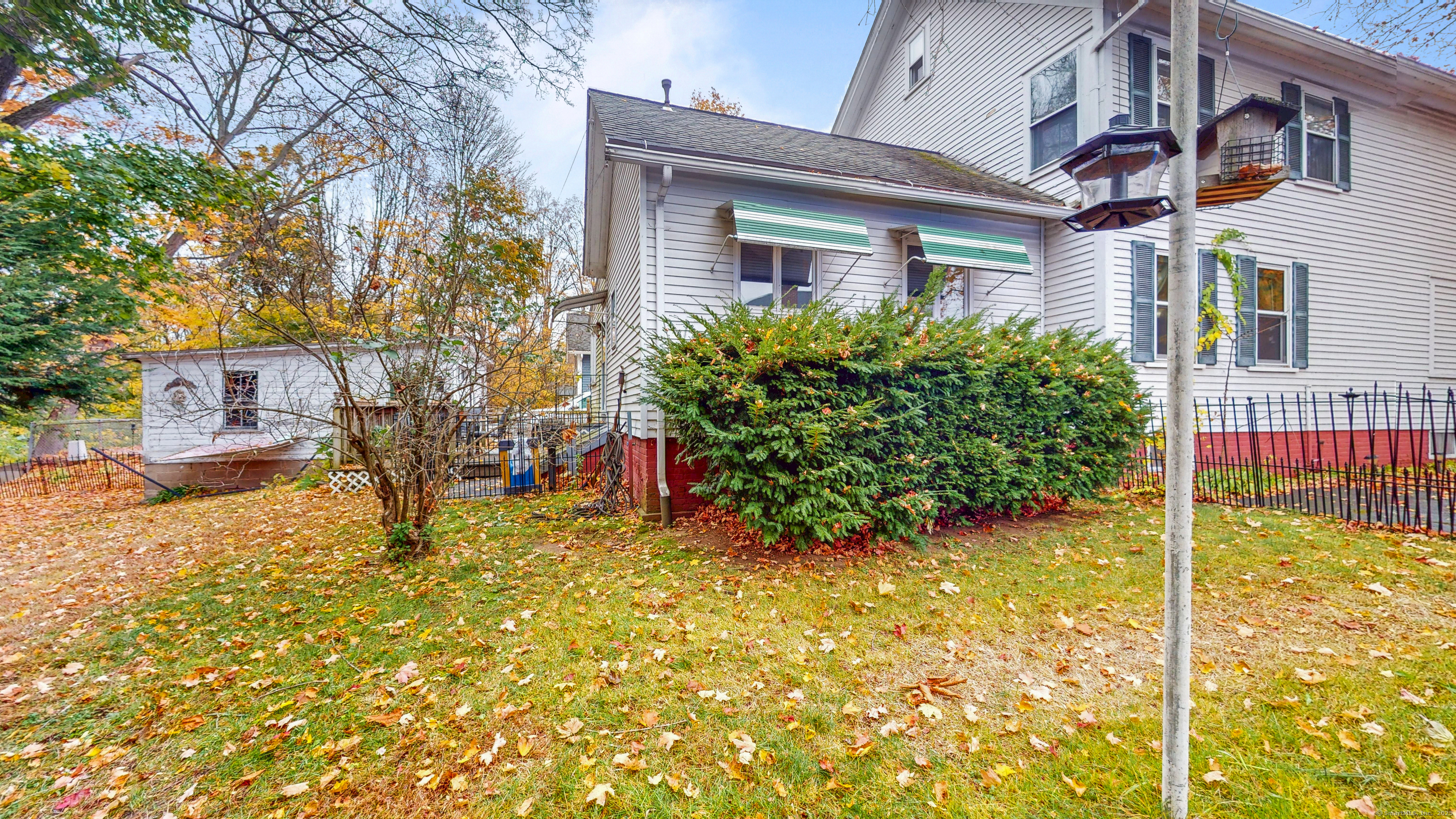 59 Elm Street Windsor Locks, CT 06096 - Photo 32 of 38 a house view with a outdoor space