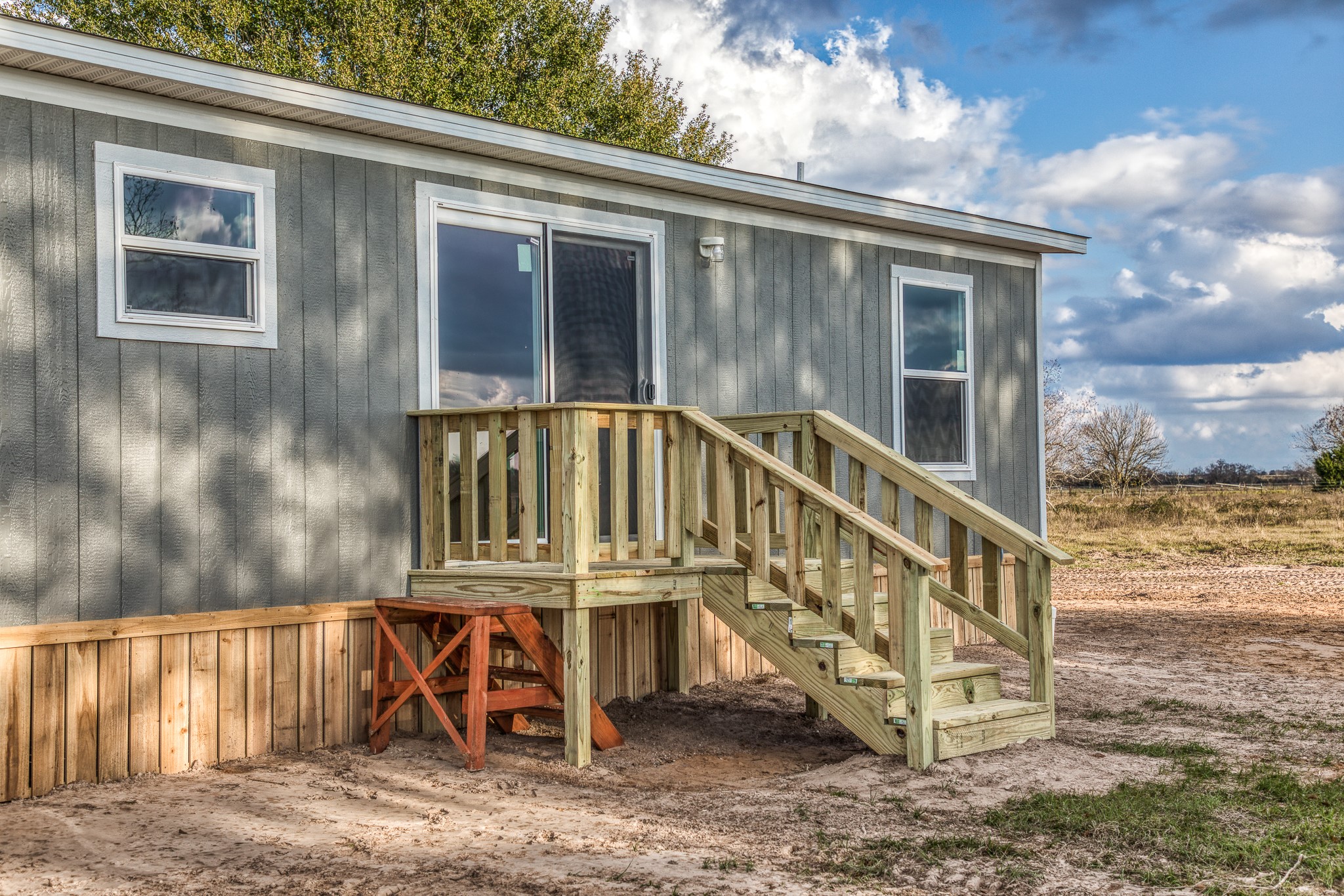 1001 Schmidt Road Waller, TX 77484 - Photo 17 of 28 a view of a house with a balcony