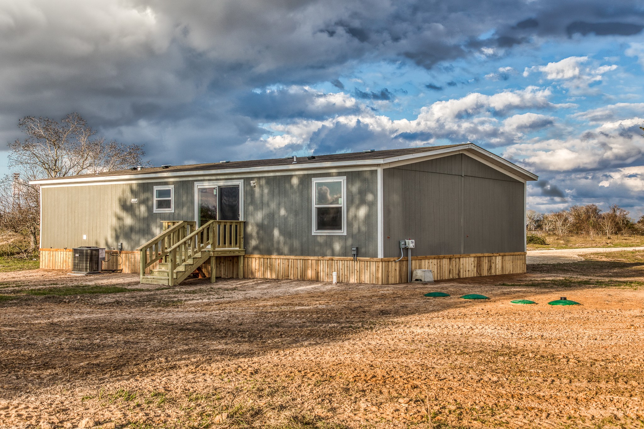 1001 Schmidt Road Waller, TX 77484 - Photo 19 of 28 a backyard of a house with table and chairs