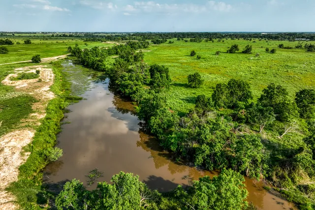 a view of a lake with a city