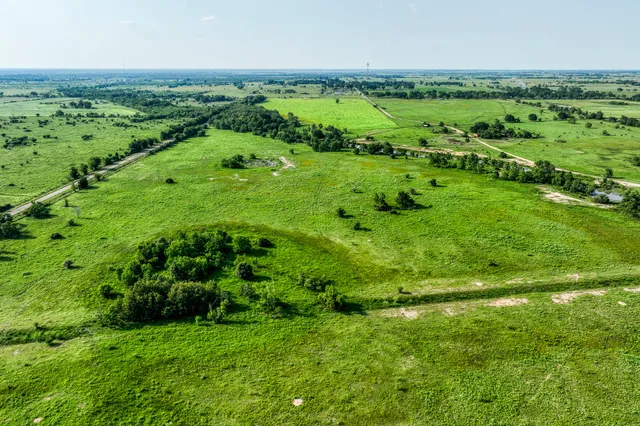 a view of a green field with lots of green space