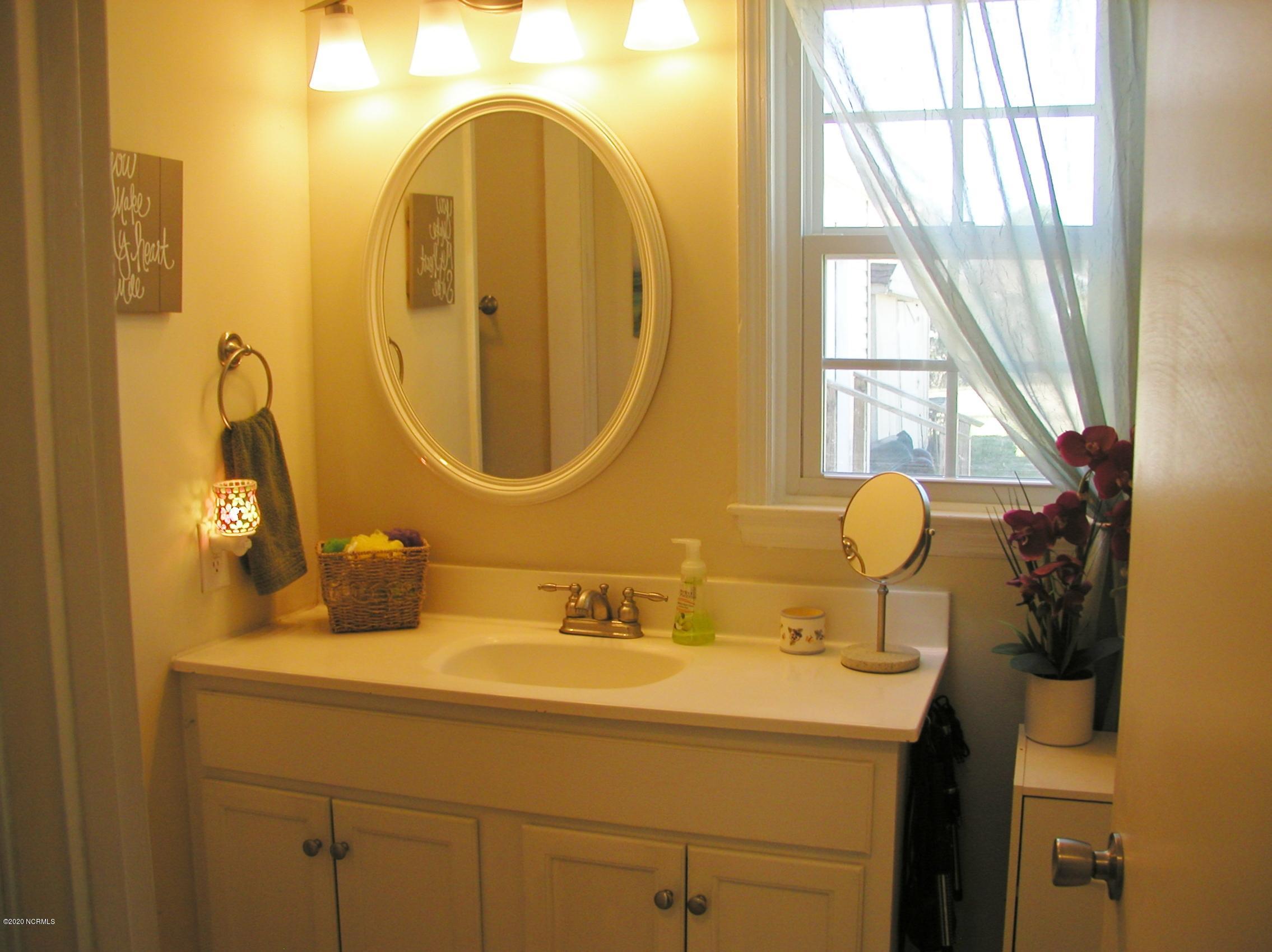 199 9 Mile Road Newport, NC 28570 - Photo 26 of 30 Hall Bath adjacent to Principal Bedroom