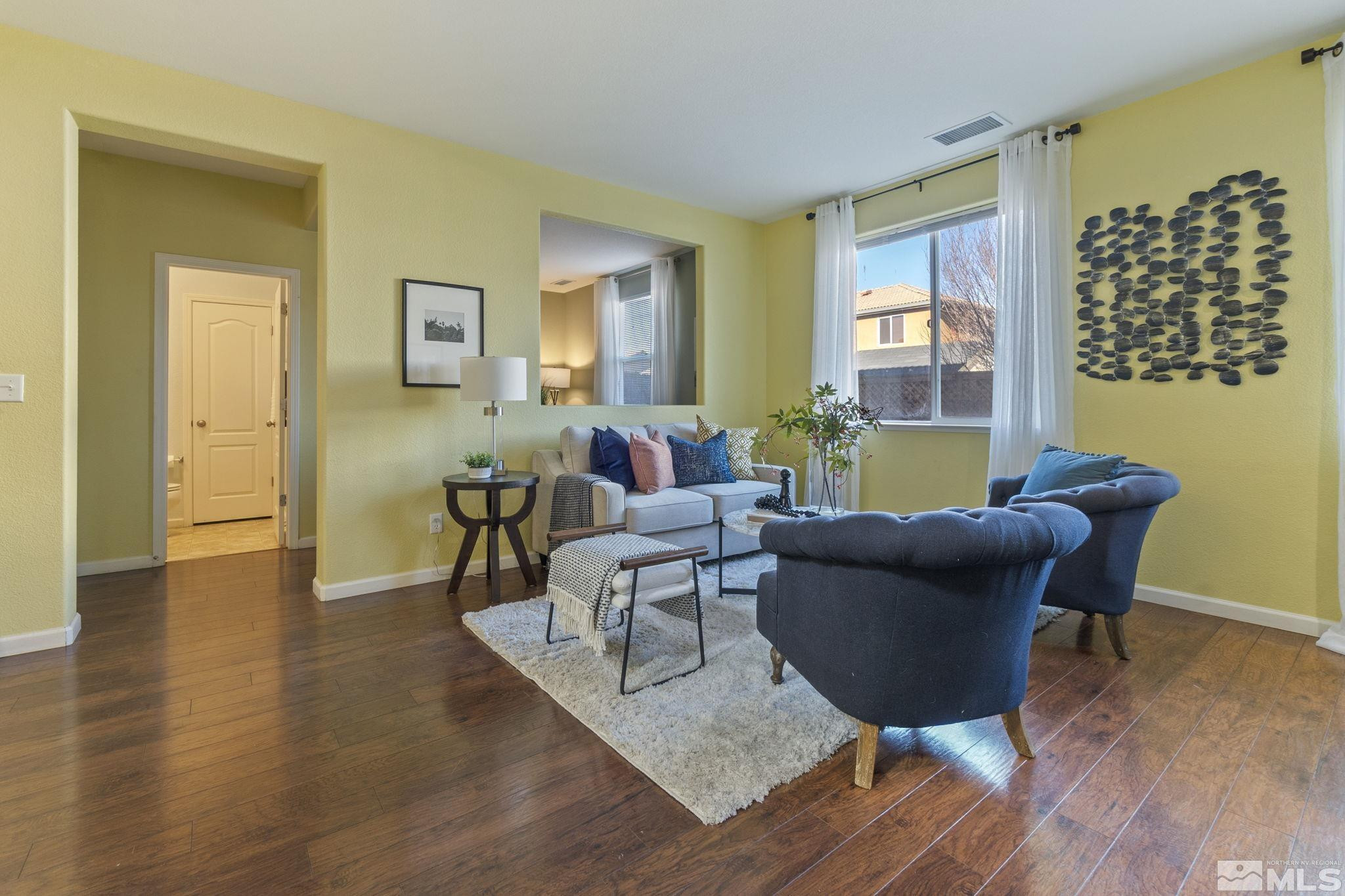 535 Terracina Way Reno, NV 89521 - Photo 8 of 40 a living room with furniture and wooden floor