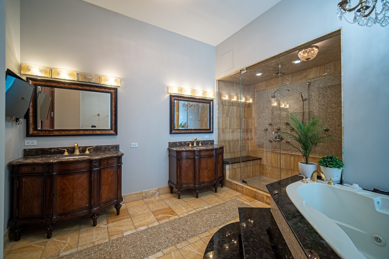 450 East Waterside Drive, Unit 3301 Chicago, IL 60601 - Photo 17 of 44 a spacious bathroom with a double vanity sink a large mirror and a bathtub