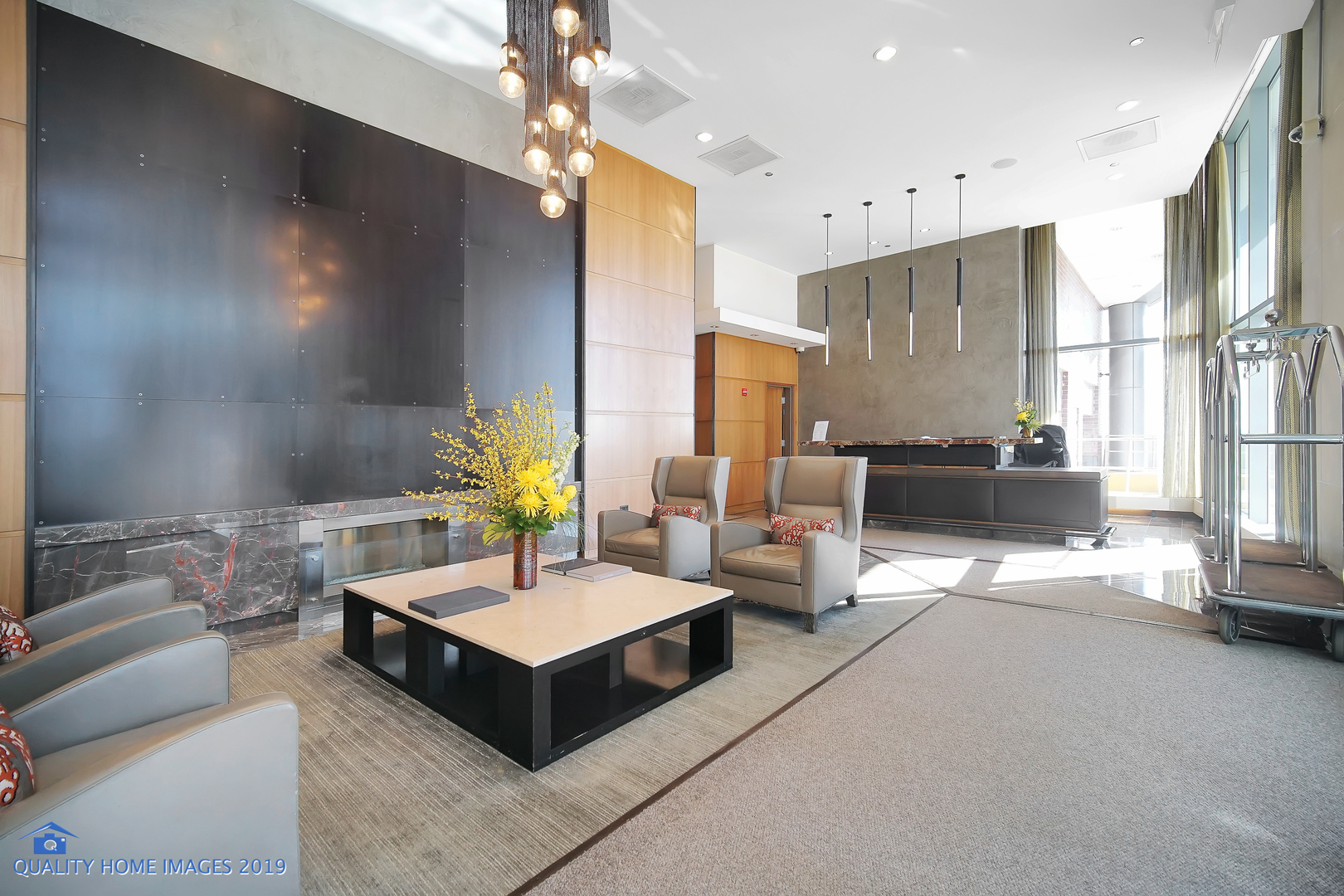 450 East Waterside Drive, Unit 3301 Chicago, IL 60601 - Photo 27 of 44 a living room with furniture and a chandelier