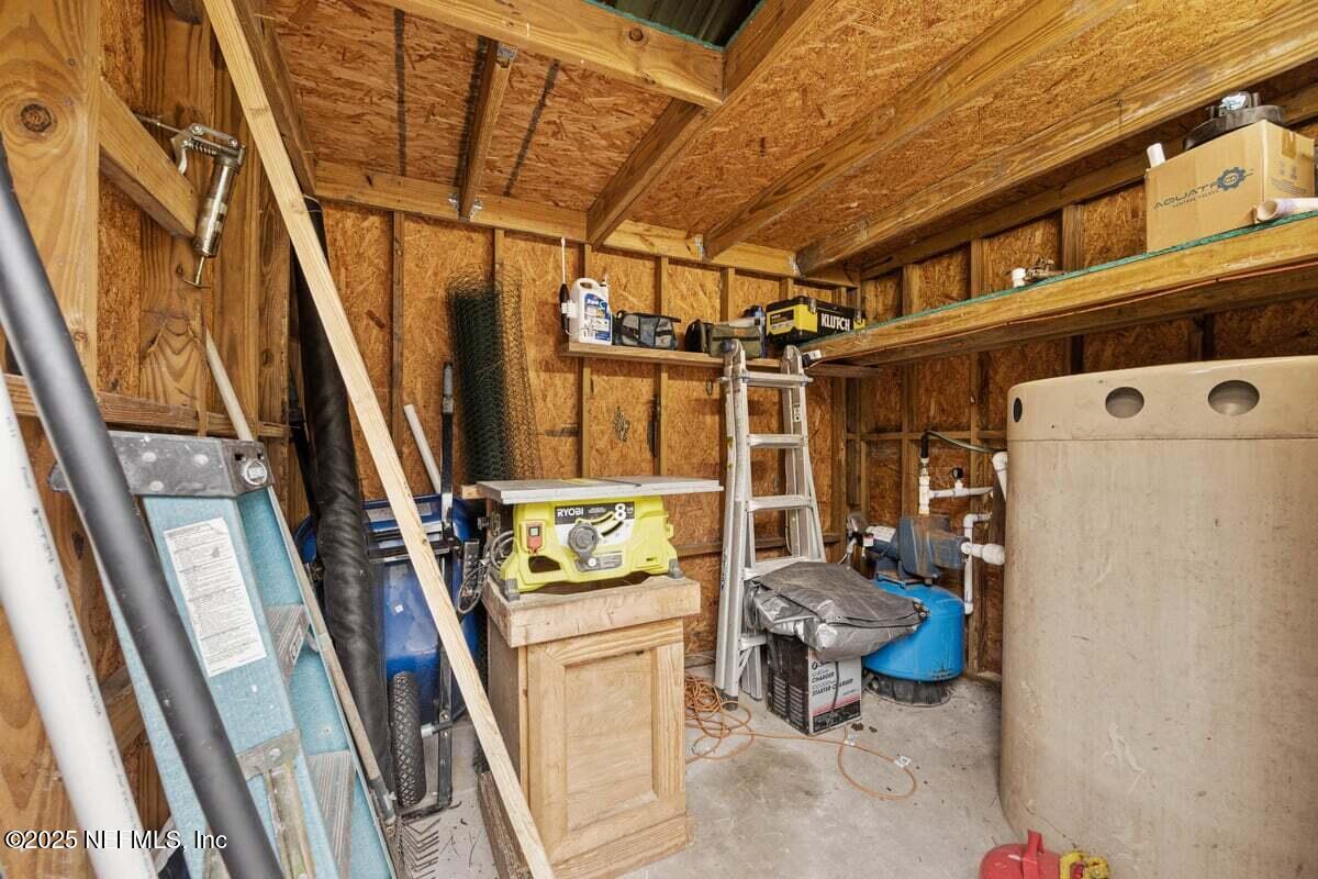 844 West River Road Palatka, FL 32177 - Photo 35 of 38 Outdoor Shed with Upper Storage