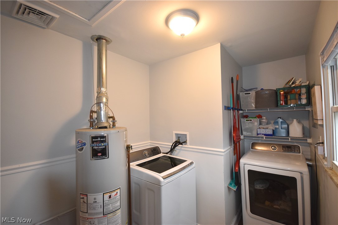 26719 Knickerbocker Road Bay Village, OH 44140 - Photo 18 of 25 Laundry room with new washer and dryer.