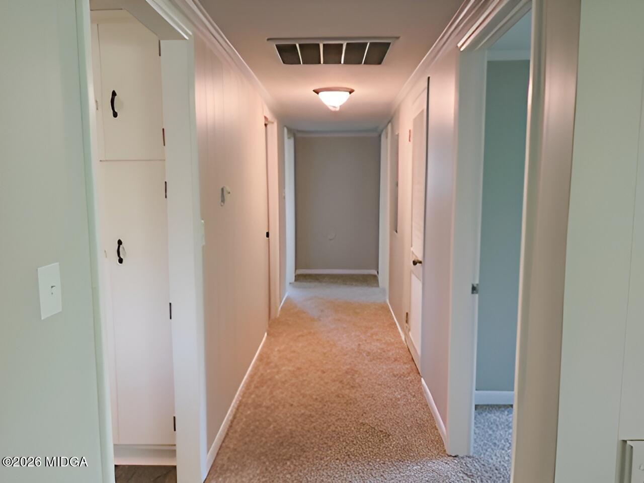 868 Mac Thompson Road Cochran, GA 31014 - Photo 15 of 31 a view of a hallway with a elevator