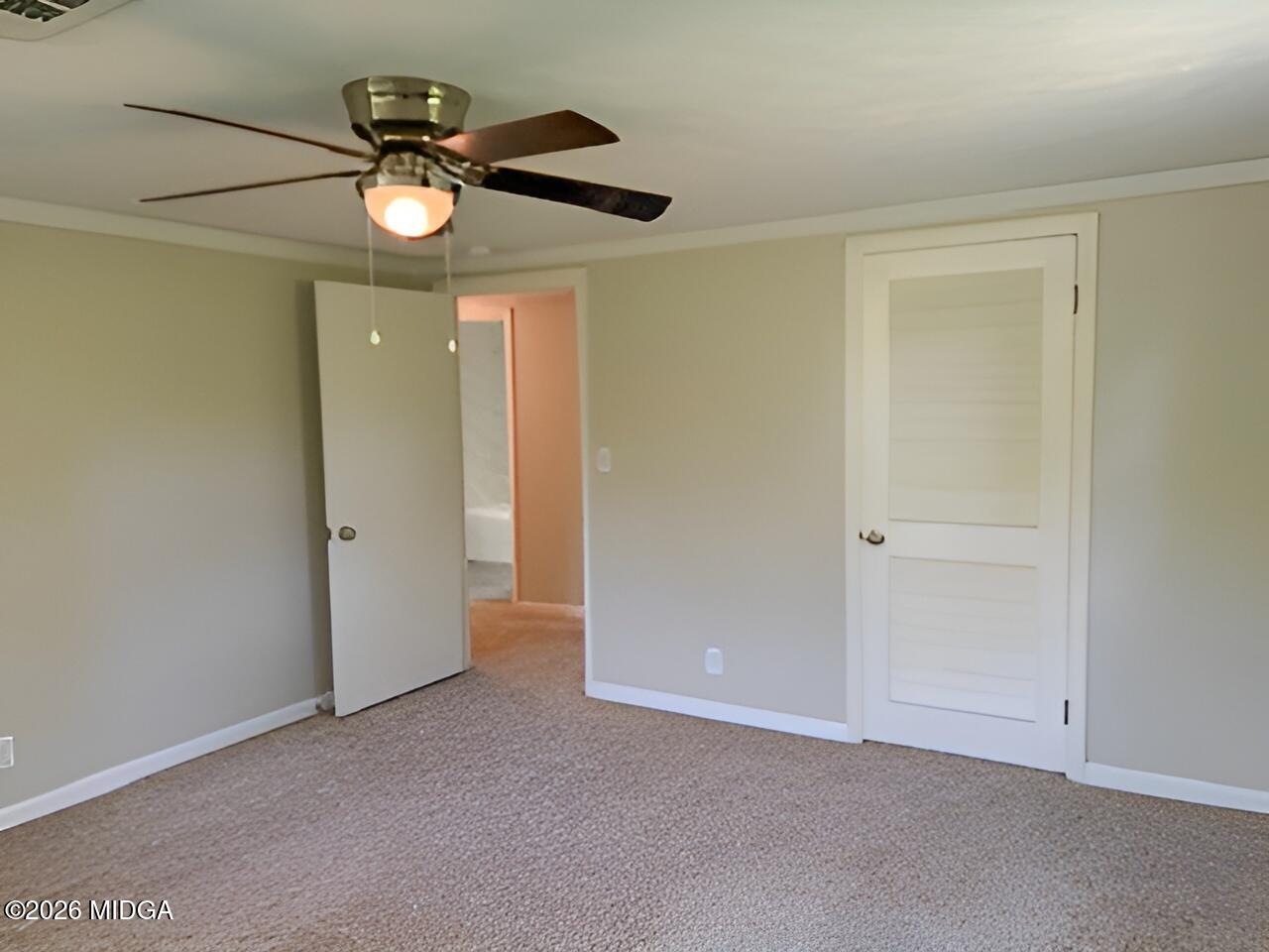 868 Mac Thompson Road Cochran, GA 31014 - Photo 21 of 31 an empty room