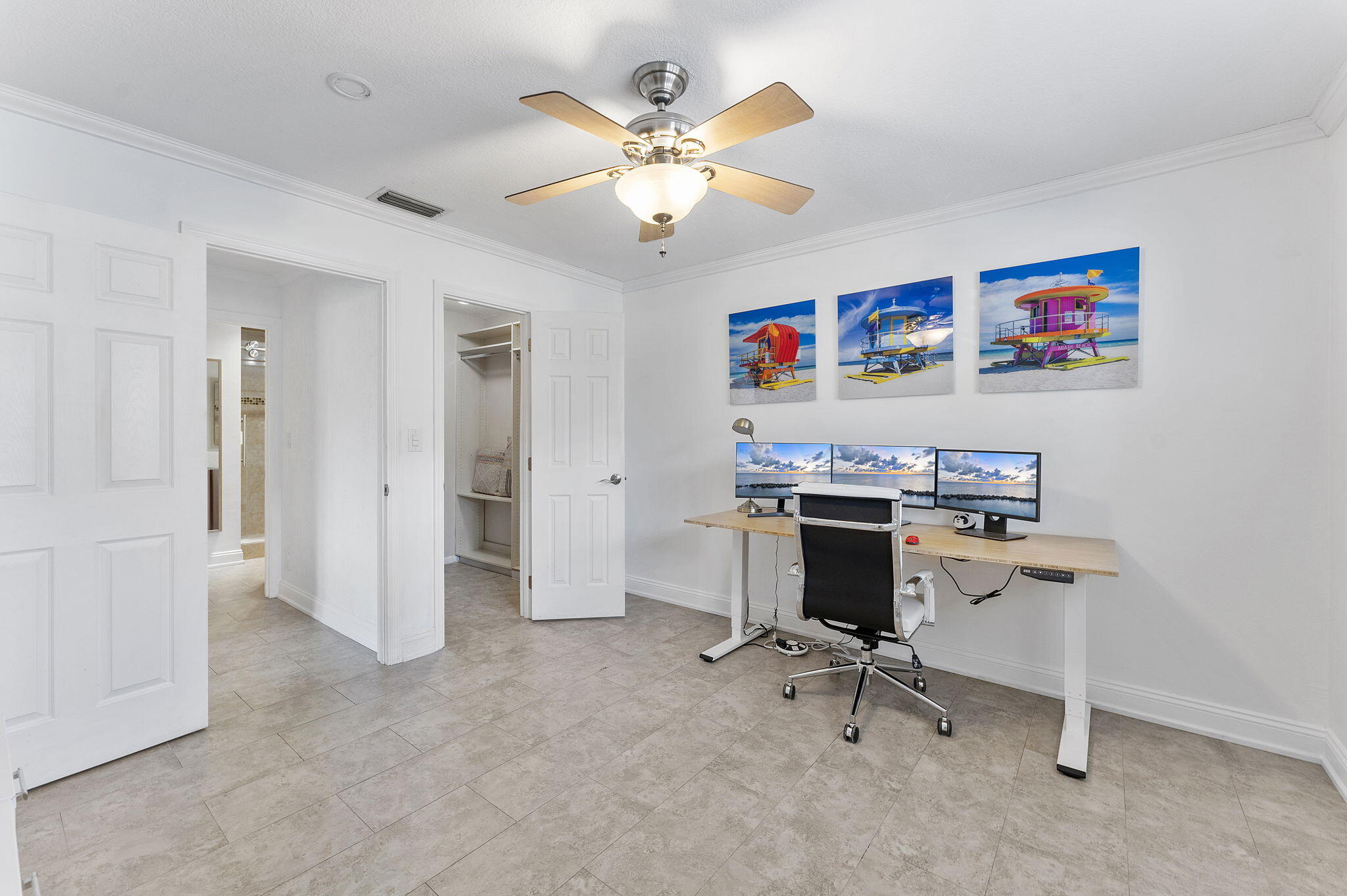 3200 Northeast 10th Street, Unit 7 Pompano Beach, FL 33062 - Photo 17 of 27 a workspace with furniture and ceiling fan